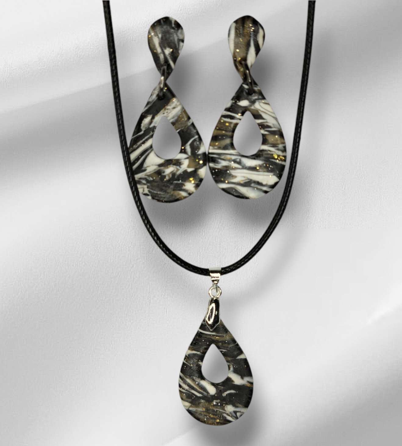 Braided Leather Cord Necklace In Black, White and Silver Leaf Earrings