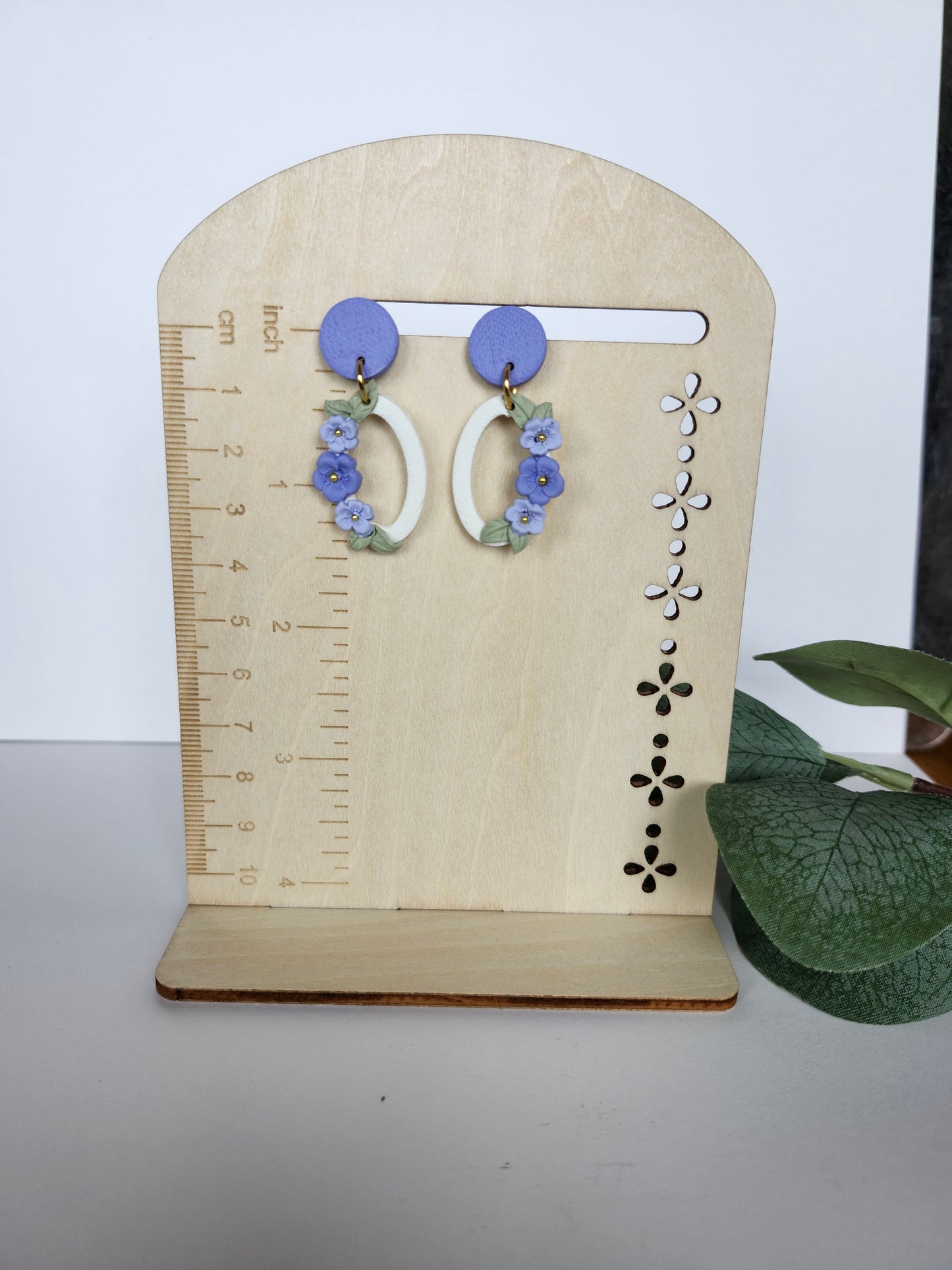Delicate Flowers on a White Oval Earring