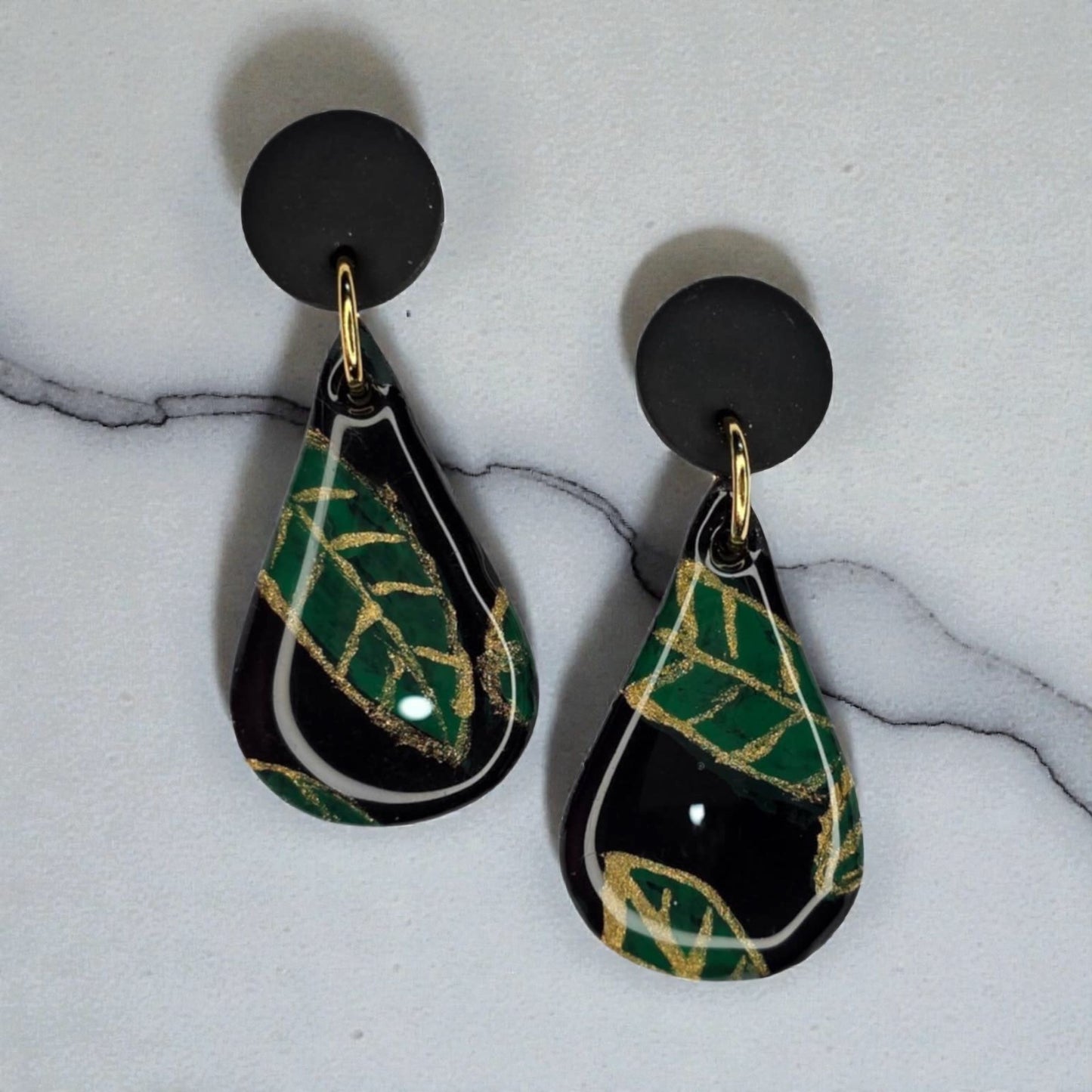 Sophisticated Black Teardrop with Leaf Design and UV Resin