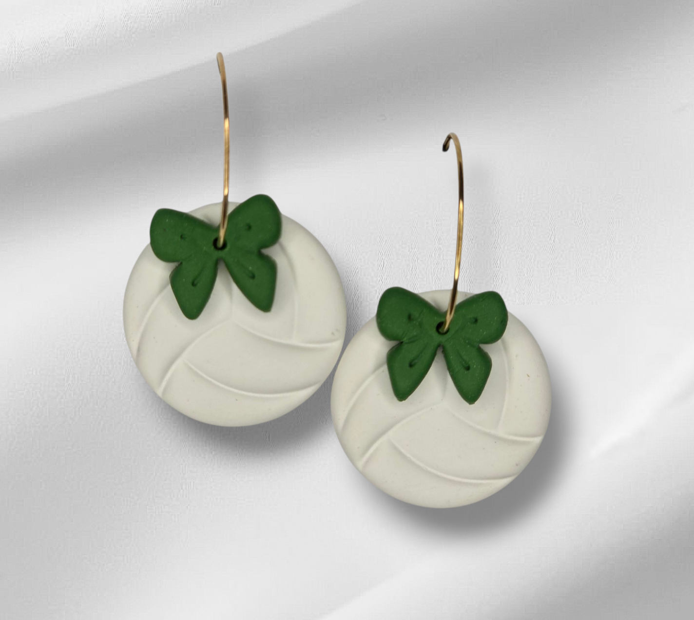 Volleyball with bow hoop earrings